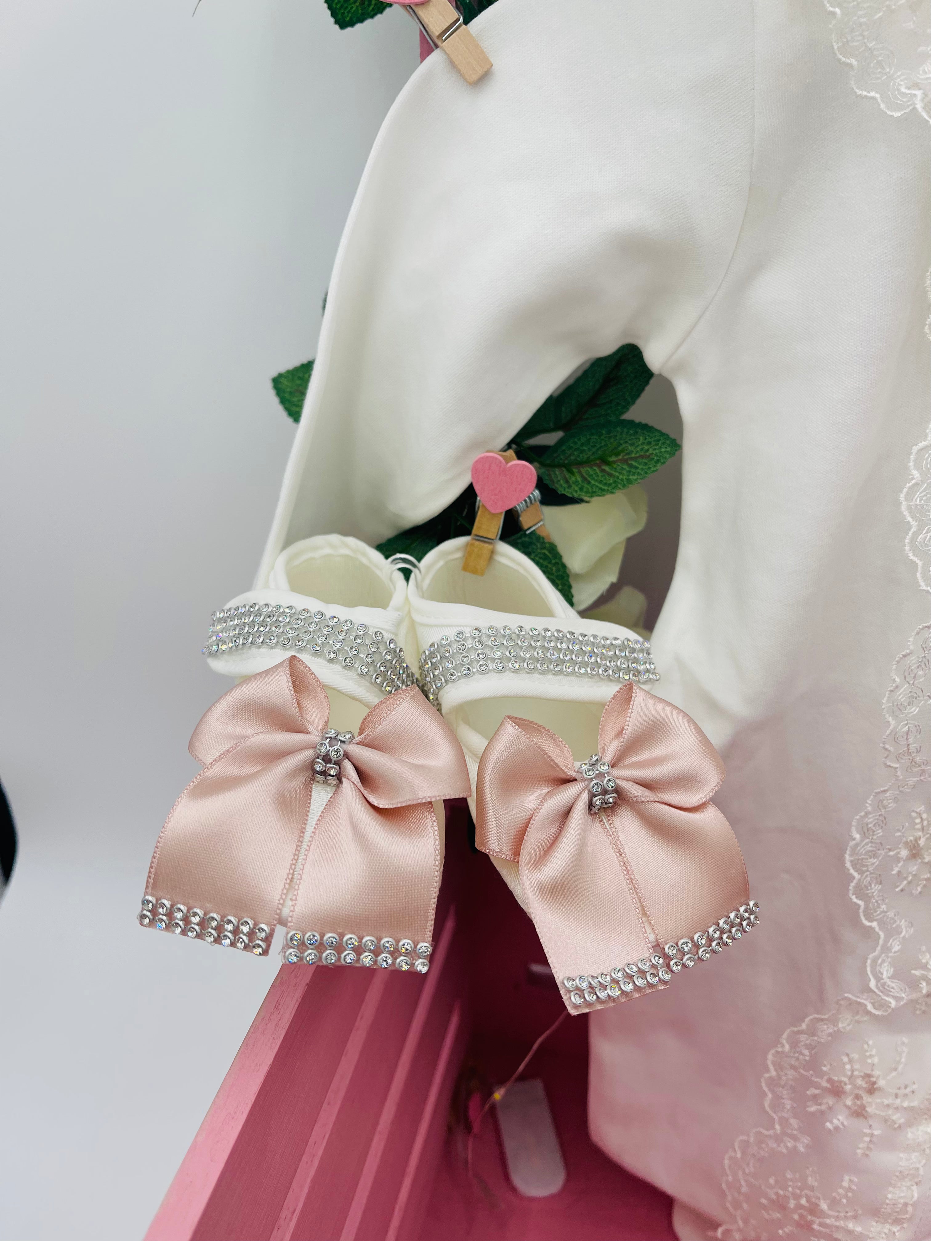 Ensemble élégant pour bébé avec nœuds blush